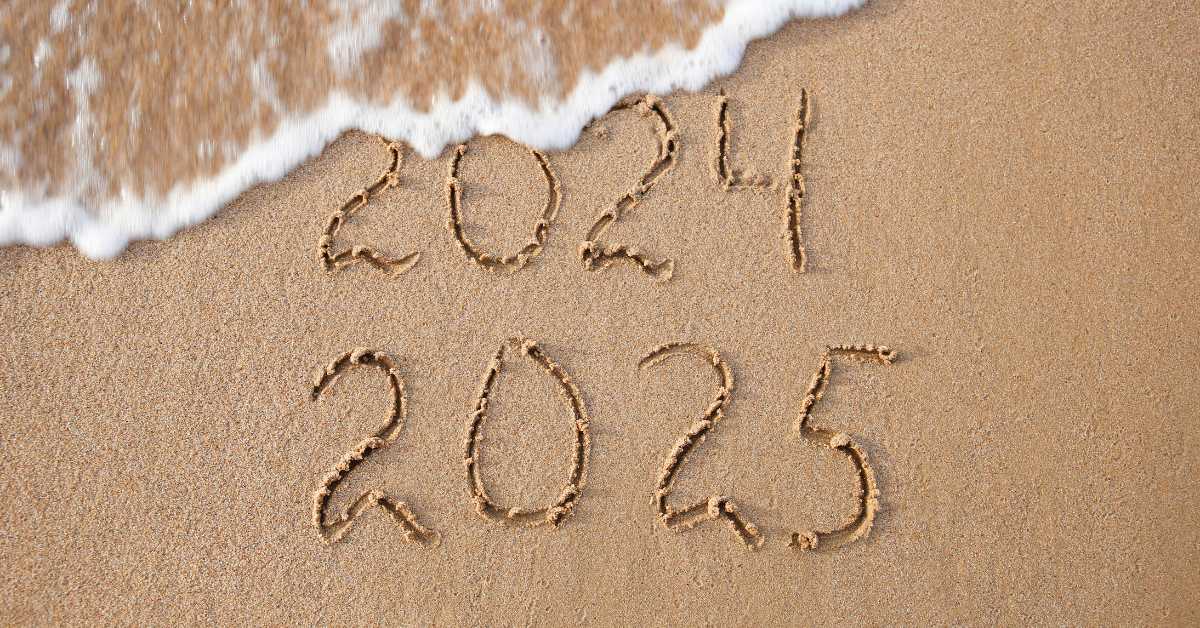 2024 and 2025 imprinted in the sand
